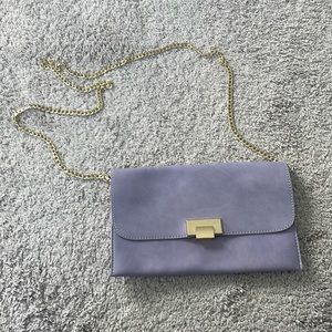 Charming Charlie’s light purple crossbody with gold chain